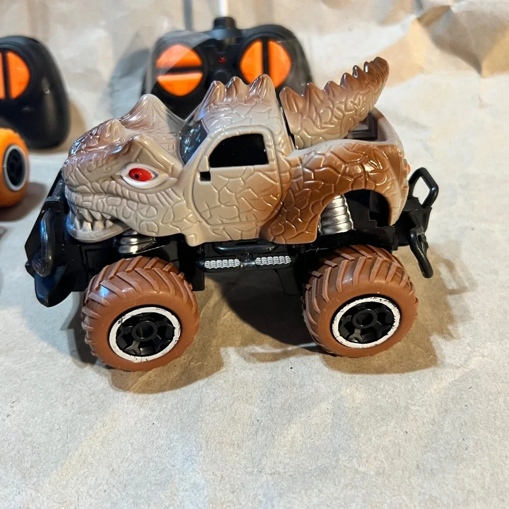 RC Monster Truck Set Dinosaur & Off-Road Brown Black Orange 2 Pack